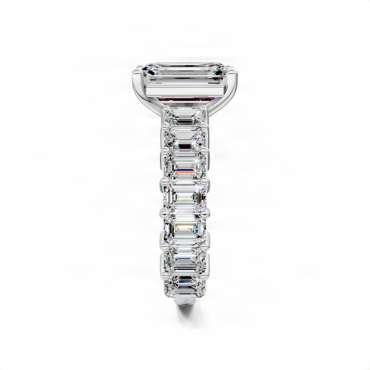 Platinum engagement ring with emerald-cut center and baguette pave band, front view