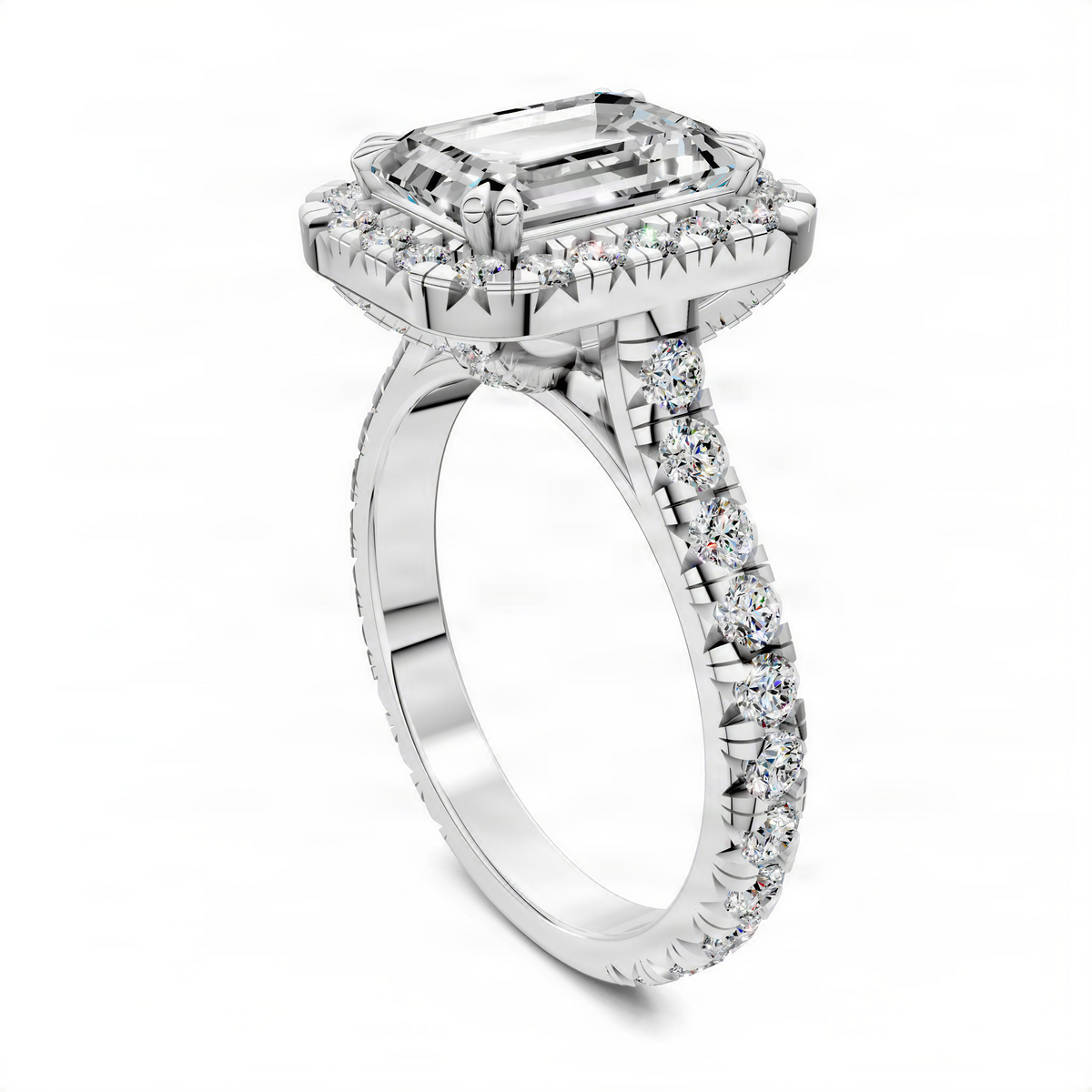 Silver-toned halo cathedral ring angled view with emerald-cut center and diamond band