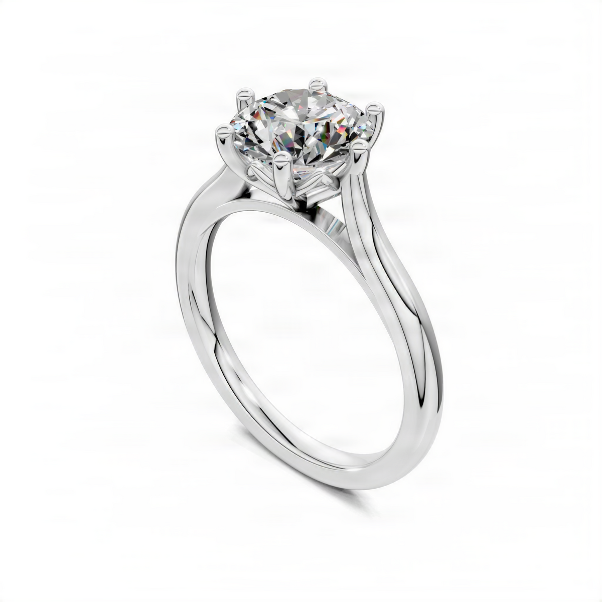 White gold solitaire engagement ring with round diamond center and sculpted band