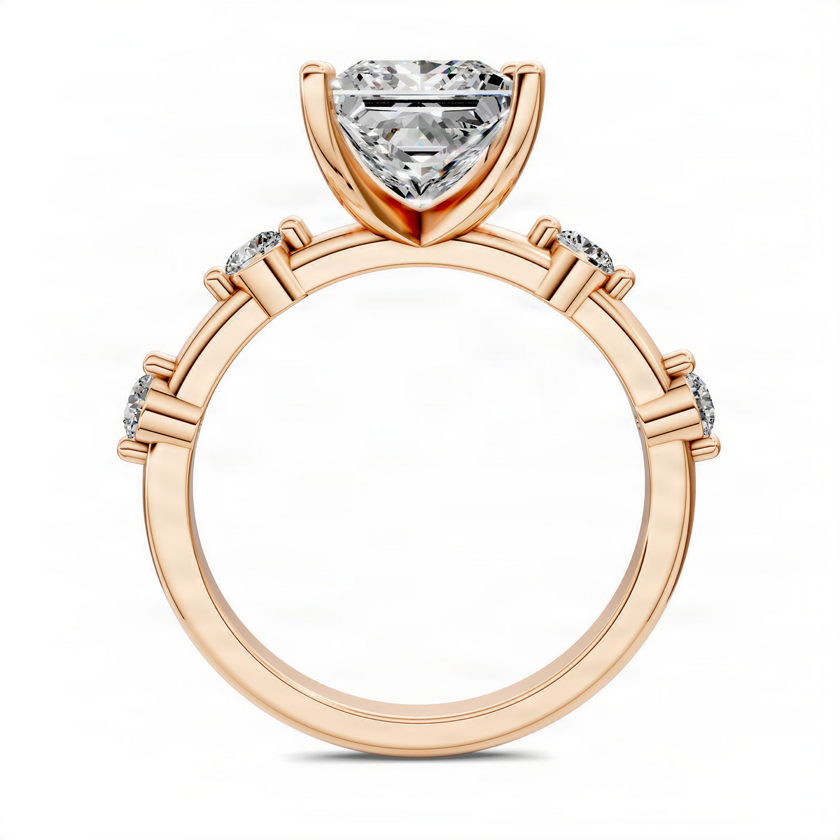 Rose gold princess-cut accent ring with large square center diamond and side stones