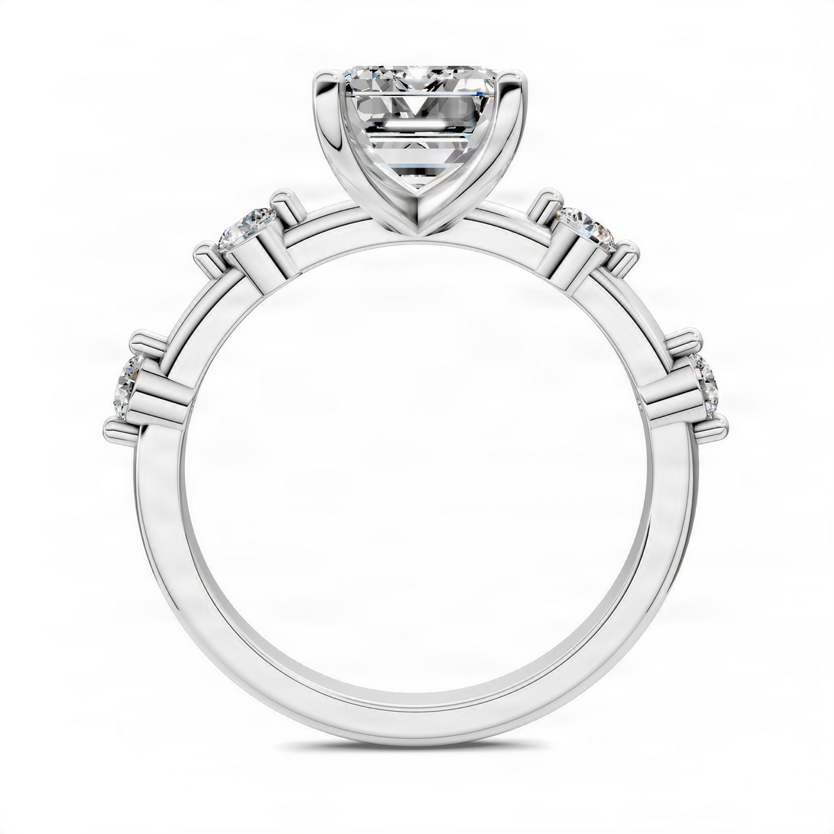 Platinum emerald-cut center ring with small side diamonds on shank