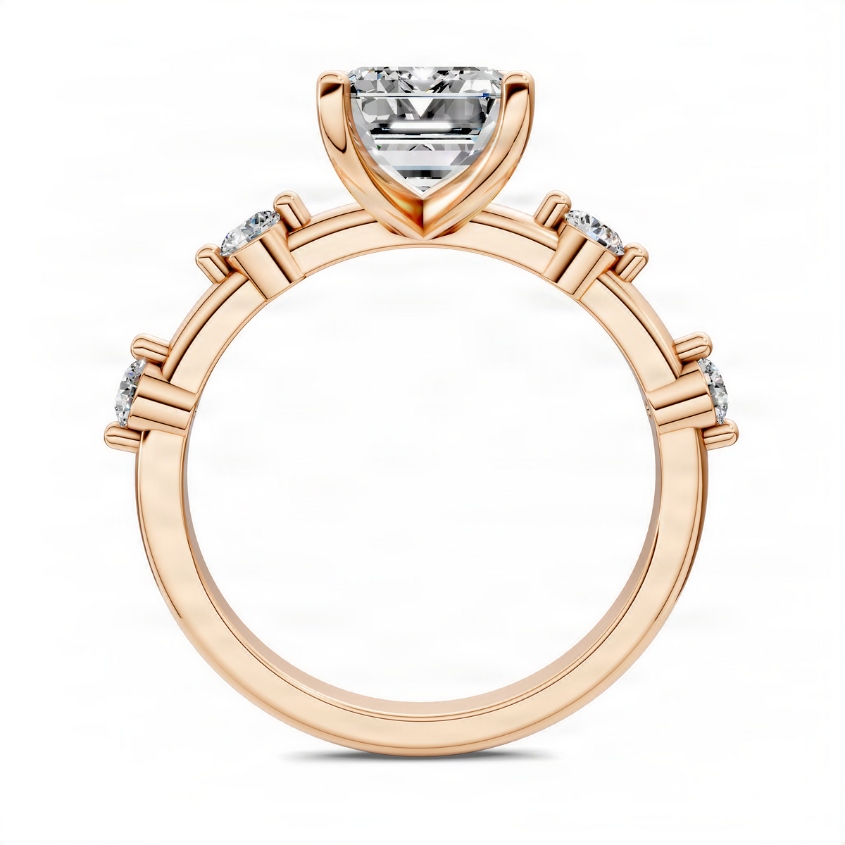 Rose gold emerald-cut center ring with small side diamonds on band
