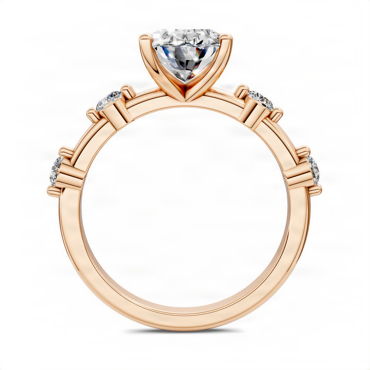 Rose gold oval accent ring with prong-set oval center stone and round accents on shoulders