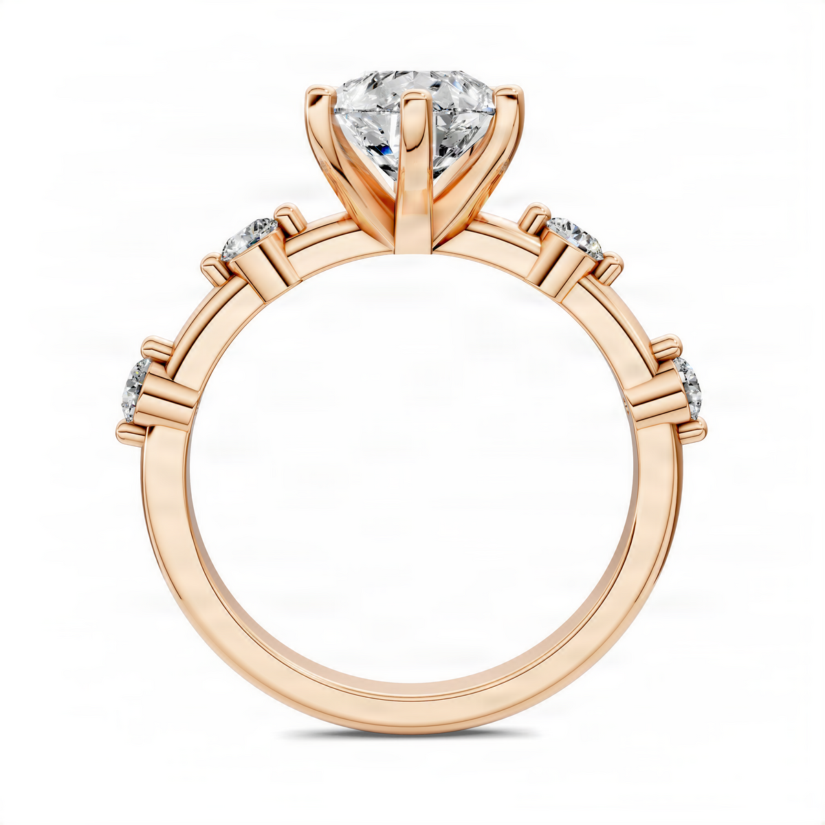 Rose gold pear accent engagement ring with pear center stone and side stone set