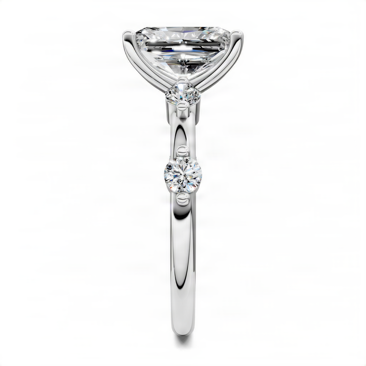 White gold round accent ring with square-cut top stone and two small round stones