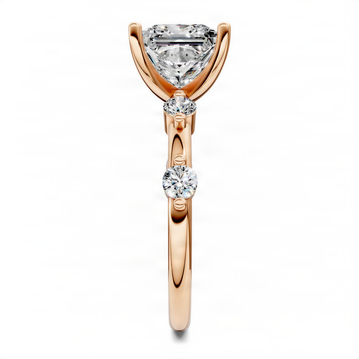 Rose gold ring with princess-cut center diamond and three round diamond accents