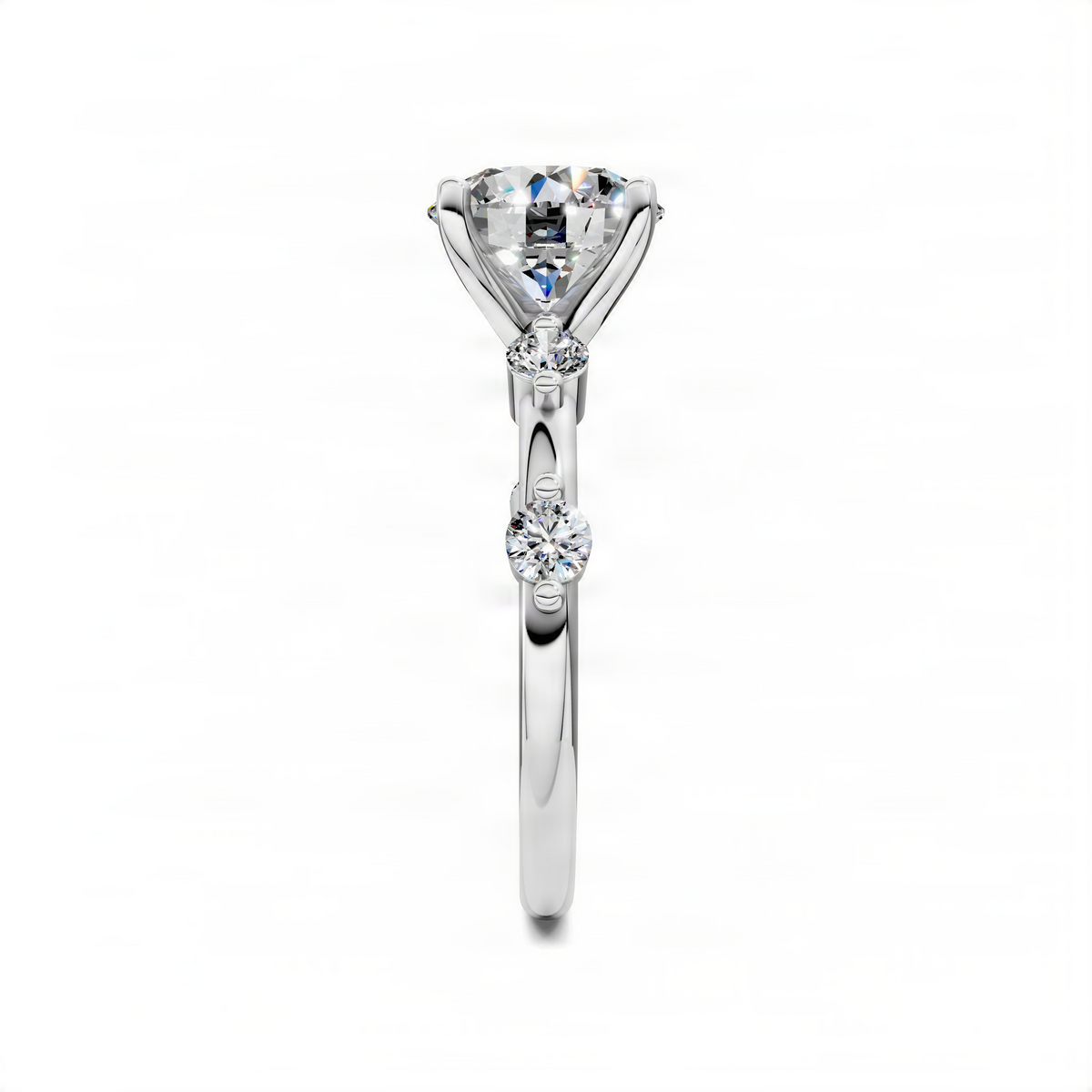 White gold vertical view accent ring with round center stone and two small round stones