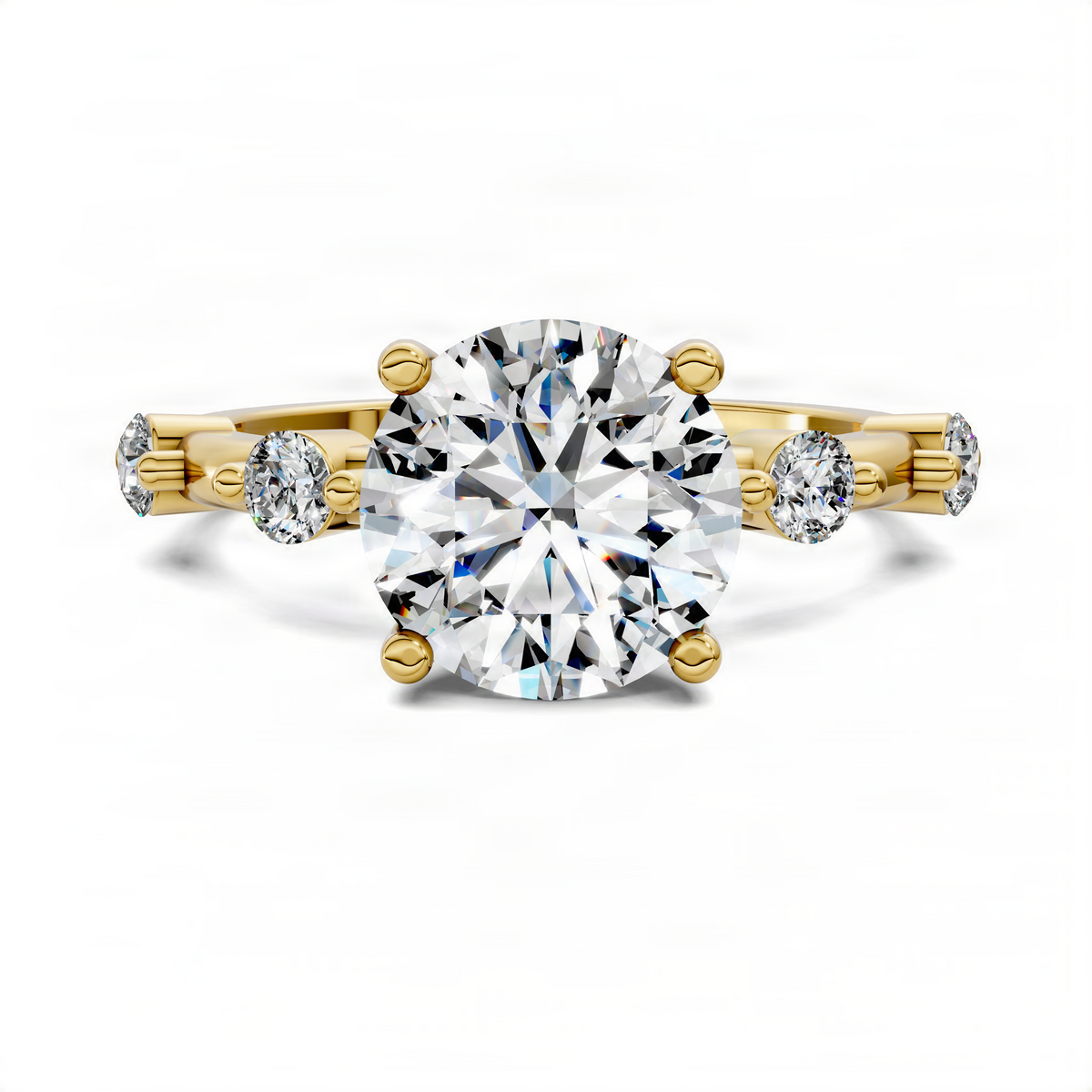 Yellow gold round center-stone accent ring with bezel prongs and small round side stones