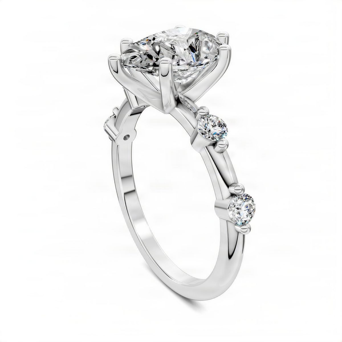 White gold ring with round center diamond and two round stones on the band