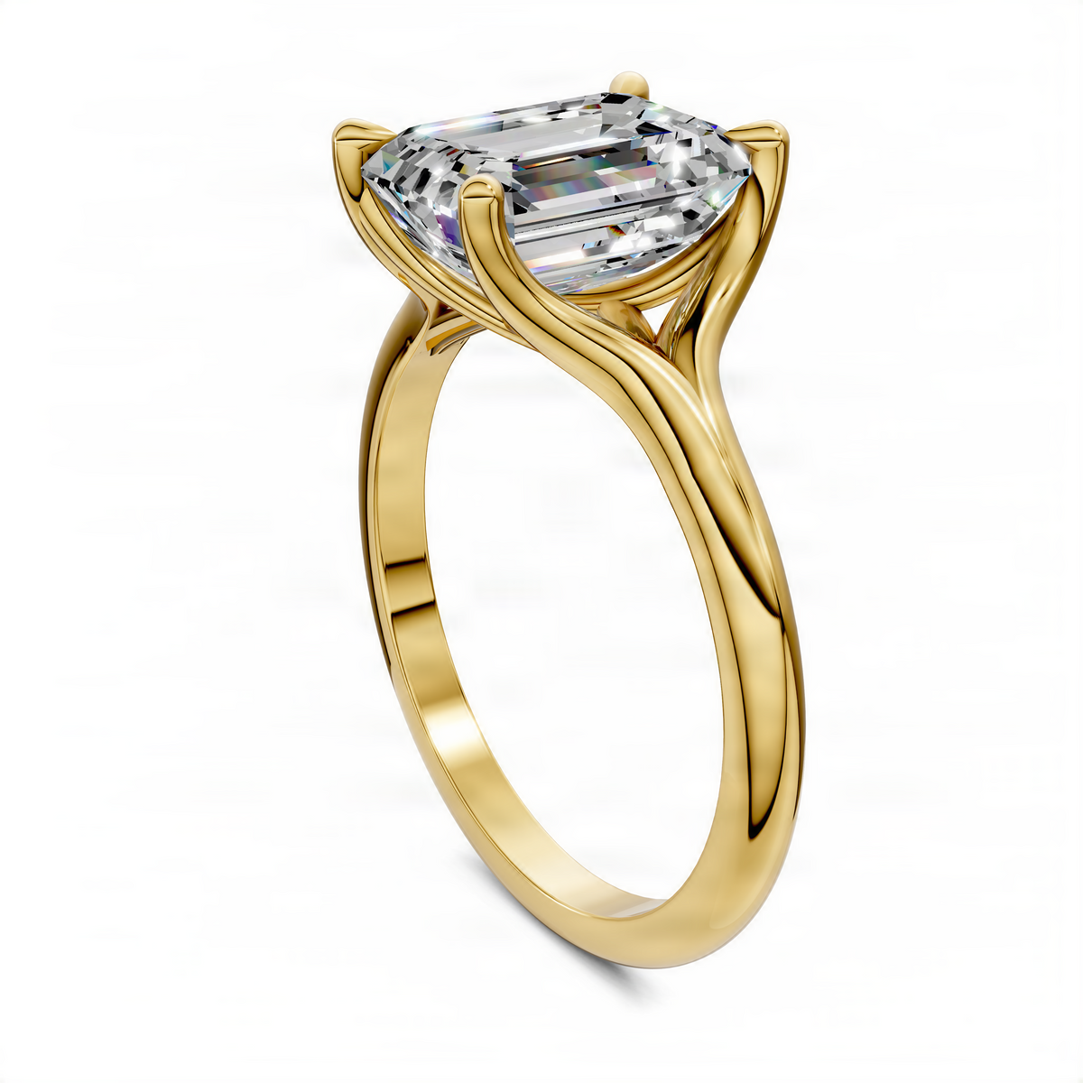 Yellow gold split-shank solitaire ring with emerald-cut center stone, angled side