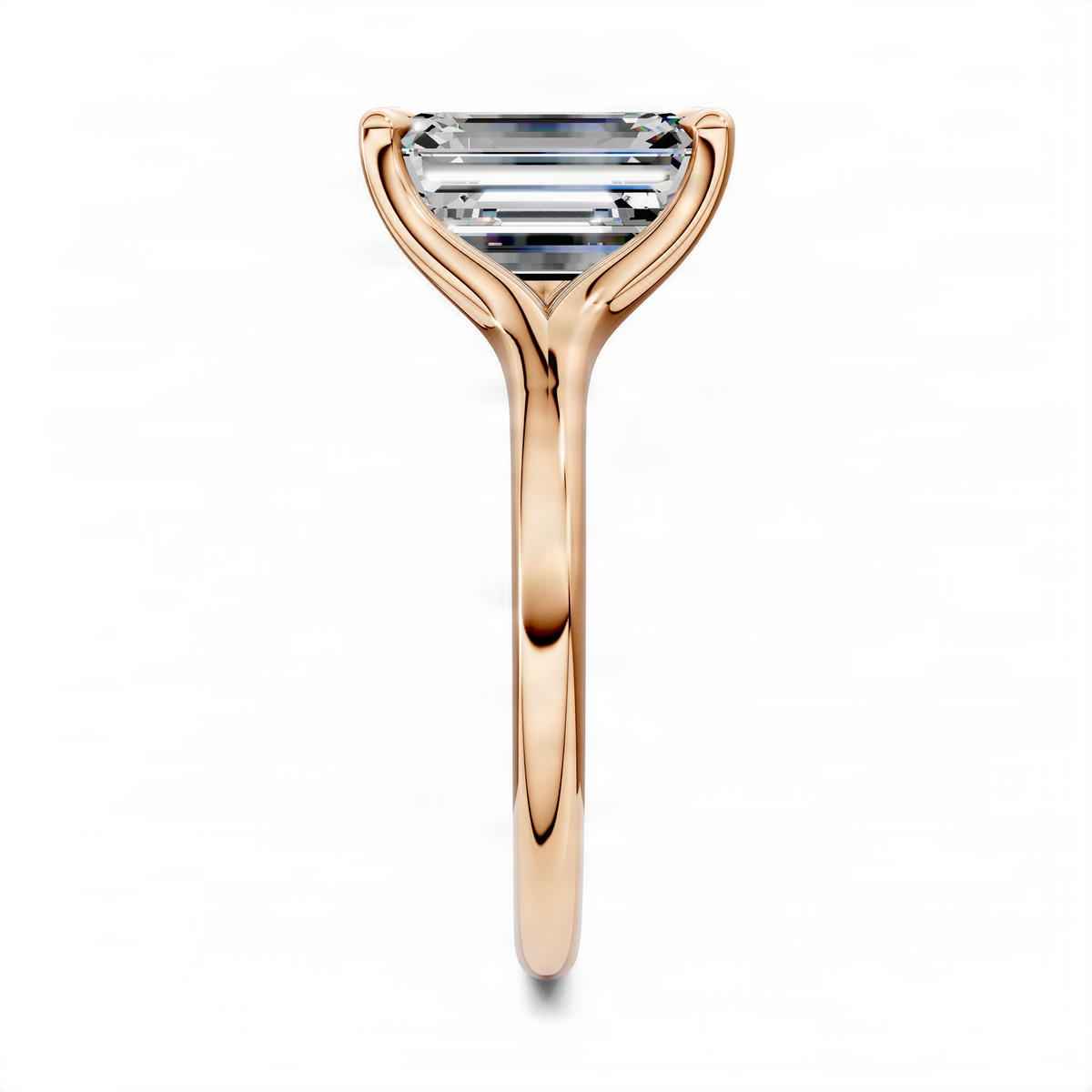 Rose gold split-shank solitaire ring with rectangular emerald-cut center stone