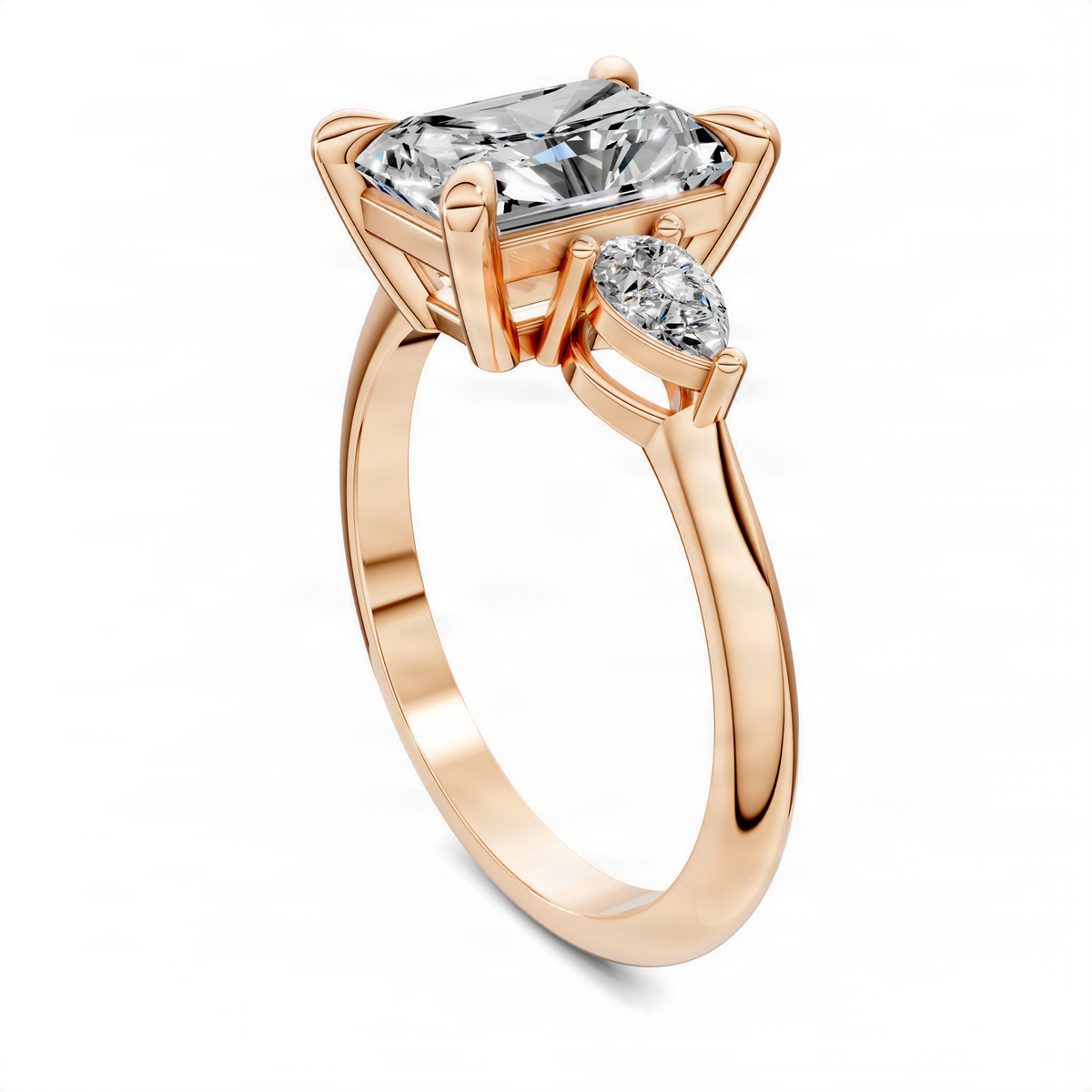 Rose gold radiant three-stone ring with prong-set radiant center and round side stones