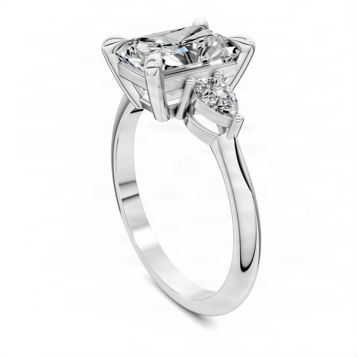 White gold radiant three-stone ring with radiant center stone and two round side stones
