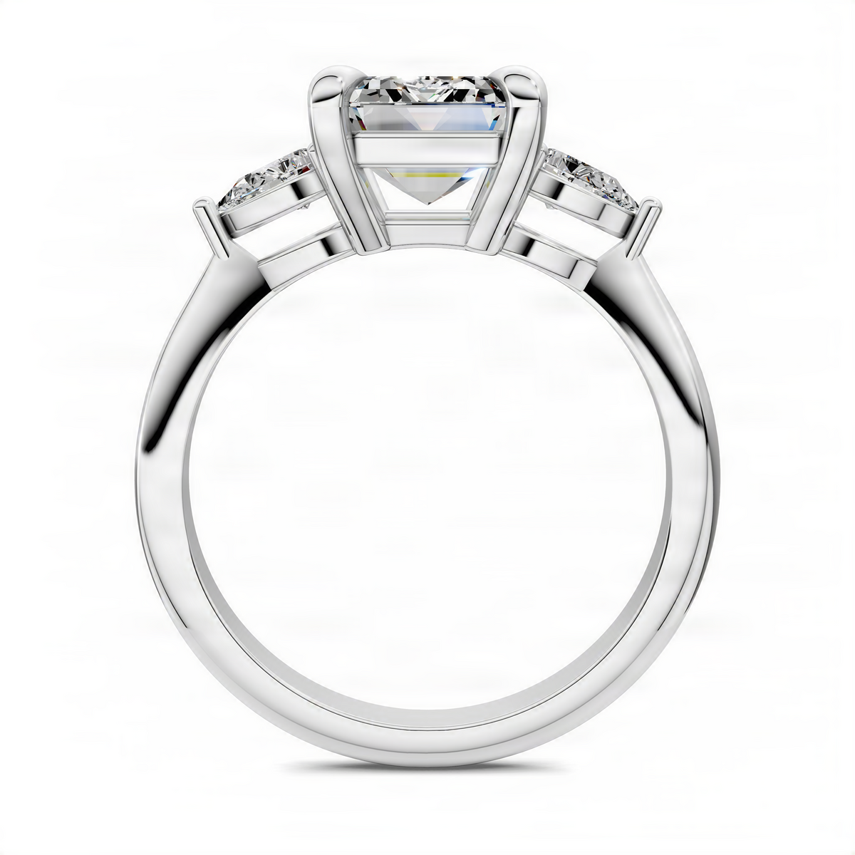 Three-stone diamond ring, emerald-cut center and prong-set side stones, white metal setting