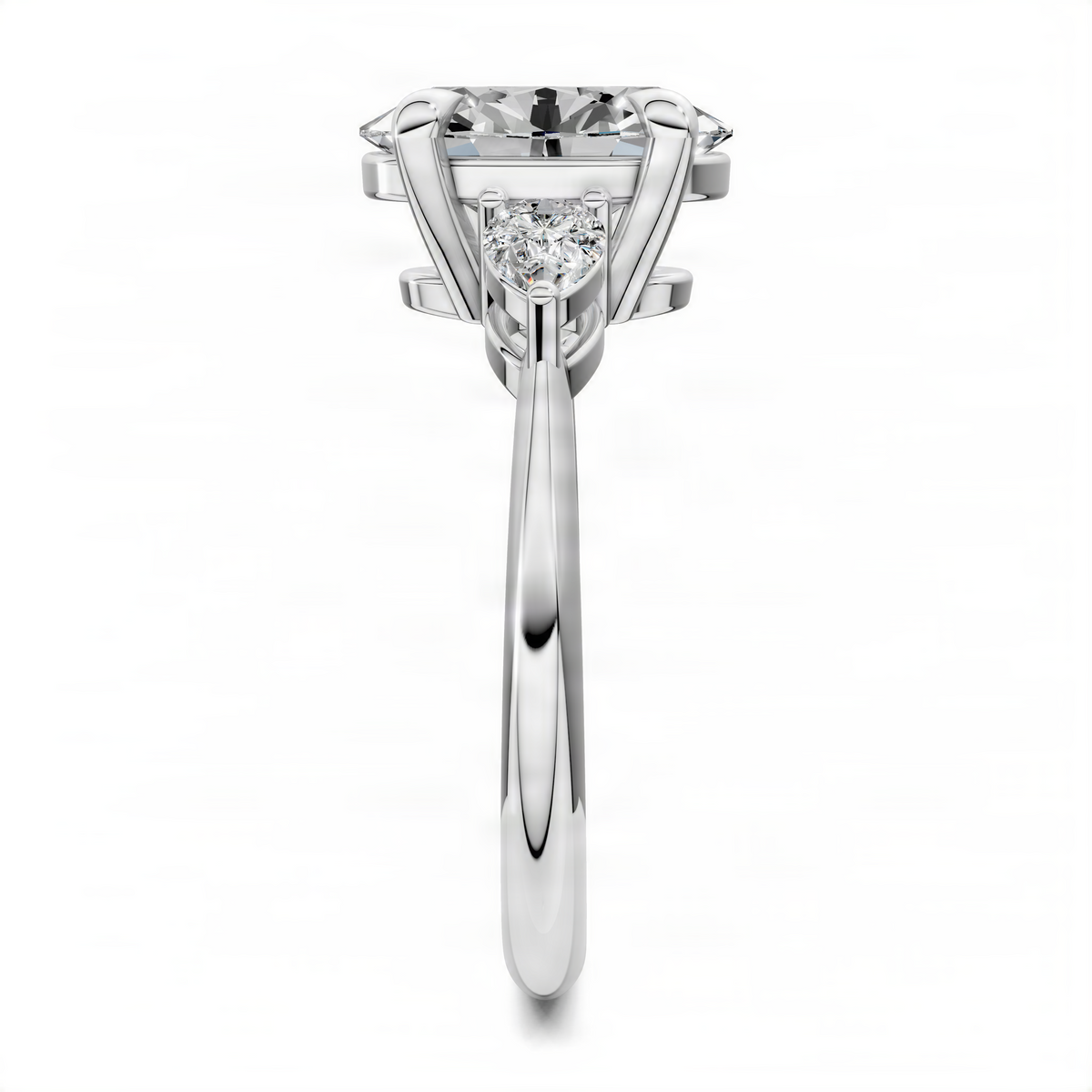 White metal oval three-stone diamond ring with central oval and two side stones