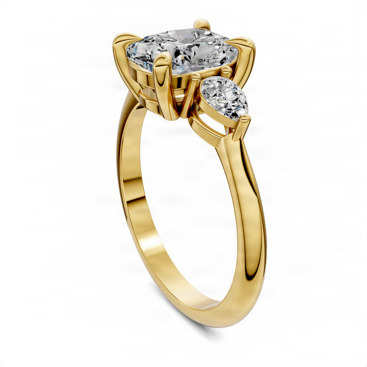 Three-stone cushion diamond ring, yellow gold with prong-set center and side stones