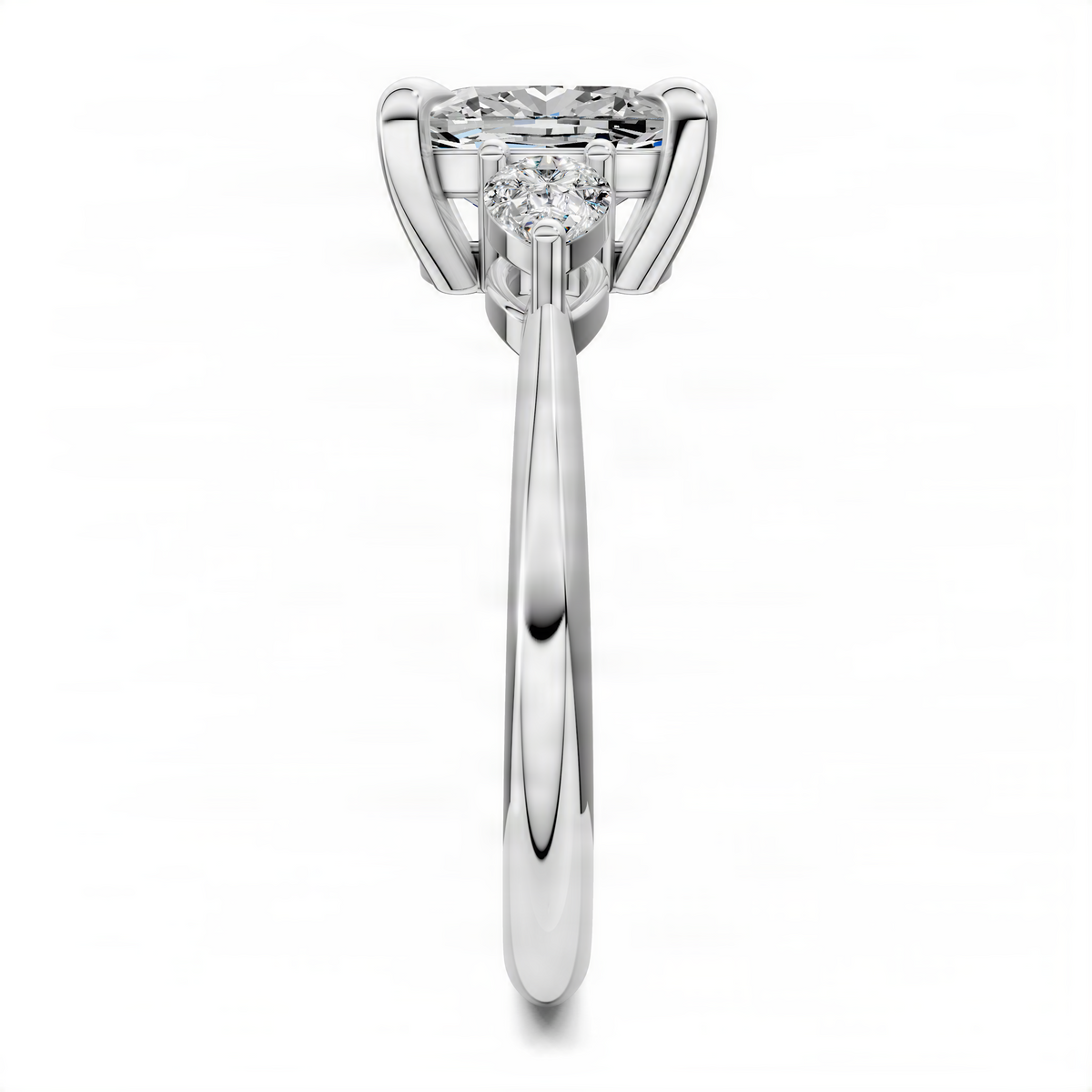 Three-stone cushion diamond ring, white gold with prong-set center and side stones