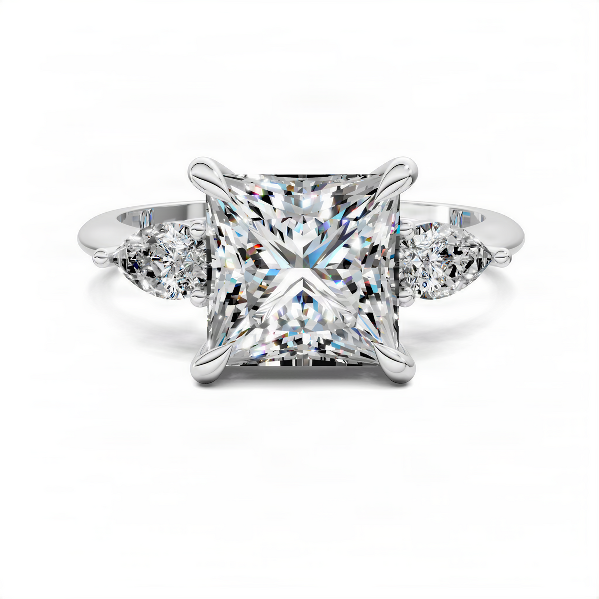 White gold three-stone princess ring with rectangular center diamond and two side diamonds