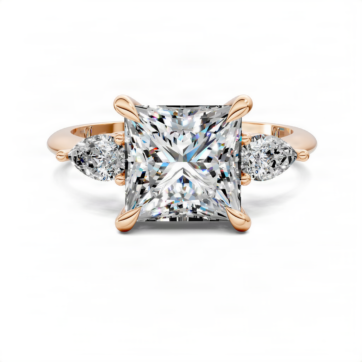 Rose gold three-stone princess ring with large rectangular center diamond and two side stones