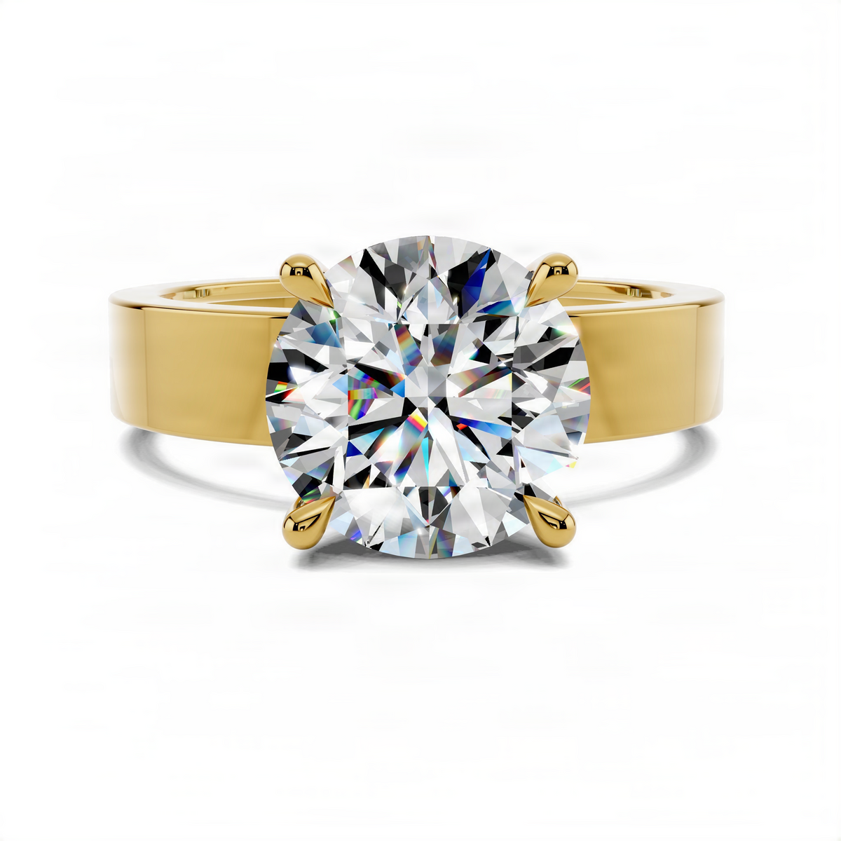 Yellow gold solitaire engagement ring featuring a large round center diamond and claw prongs