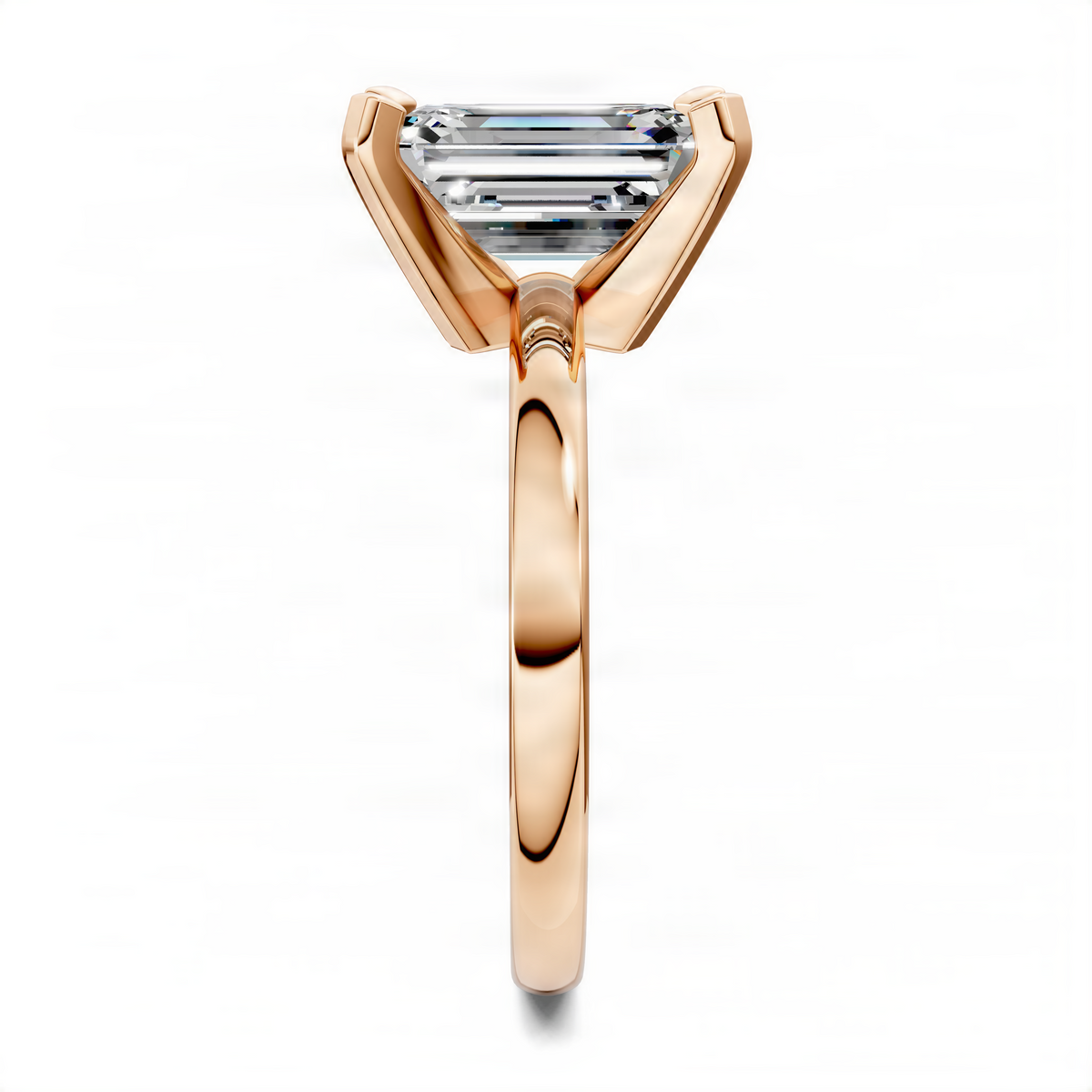 Rose gold emerald-cut solitaire ring with four prongs