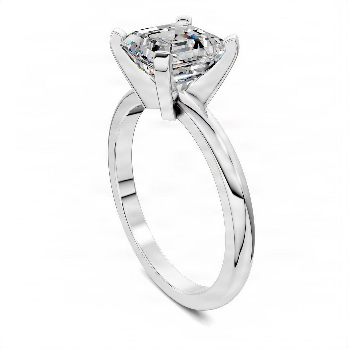 White gold solitaire ring with Asscher-cut center stone and four corner prongs