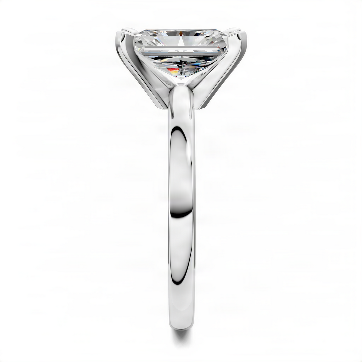White metal solitaire ring with four-prong princess-cut diamond; sleek polished shank