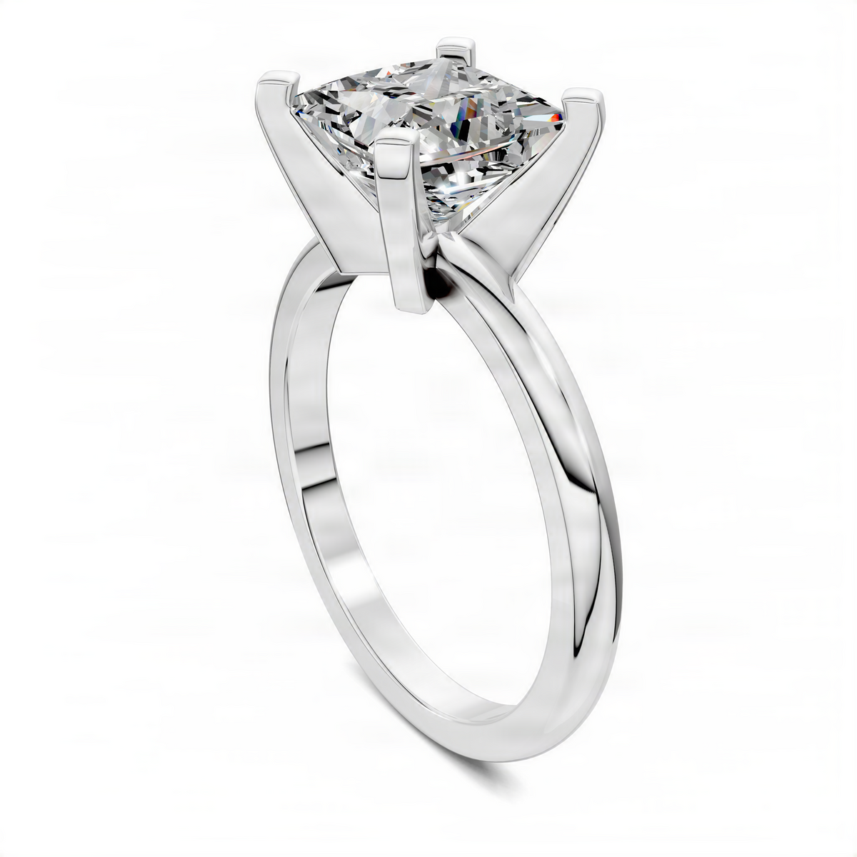 Princess-cut solitaire diamond engagement ring with four prongs and curved split band, white metal