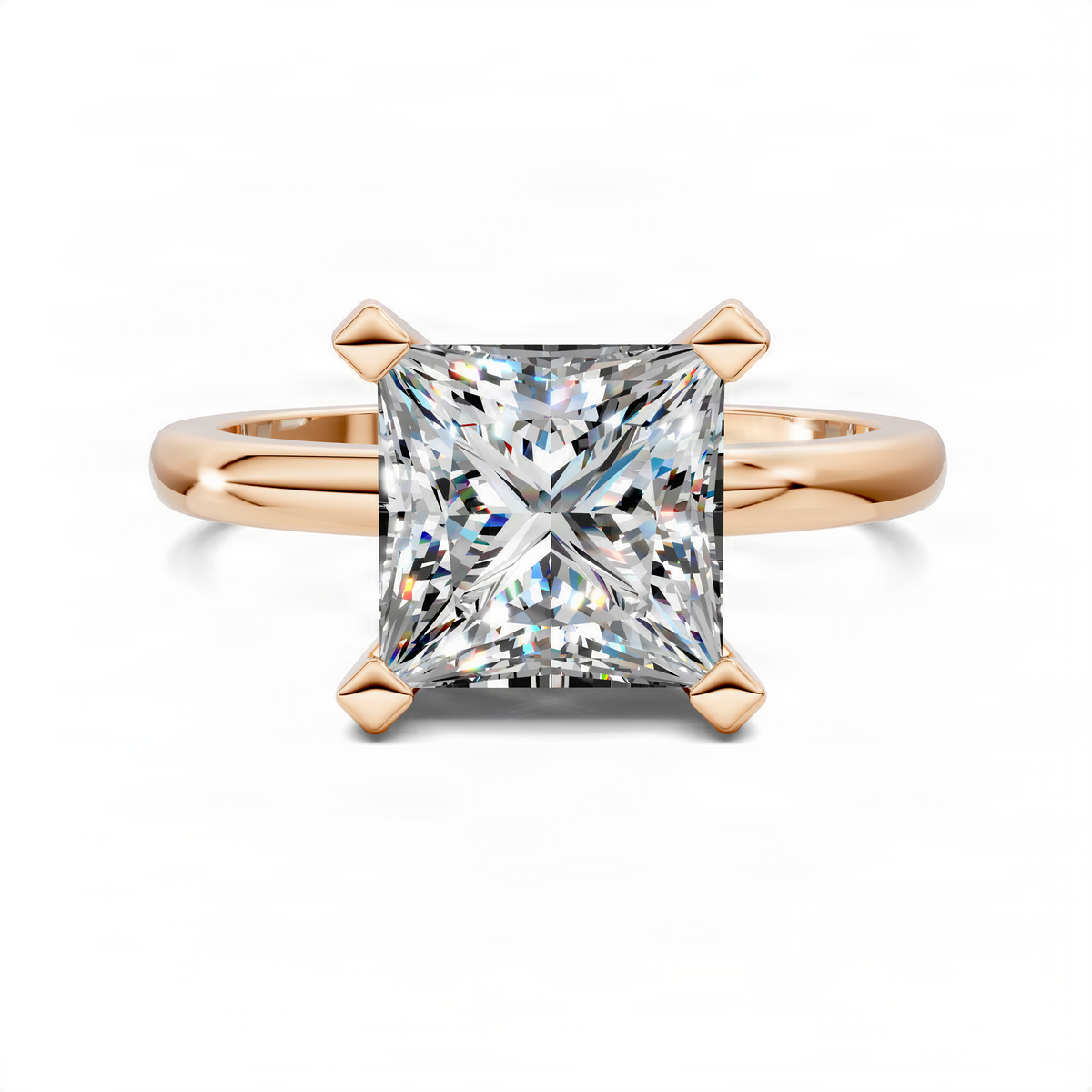 Gold princess-cut solitaire ring with square diamond and four corner prongs