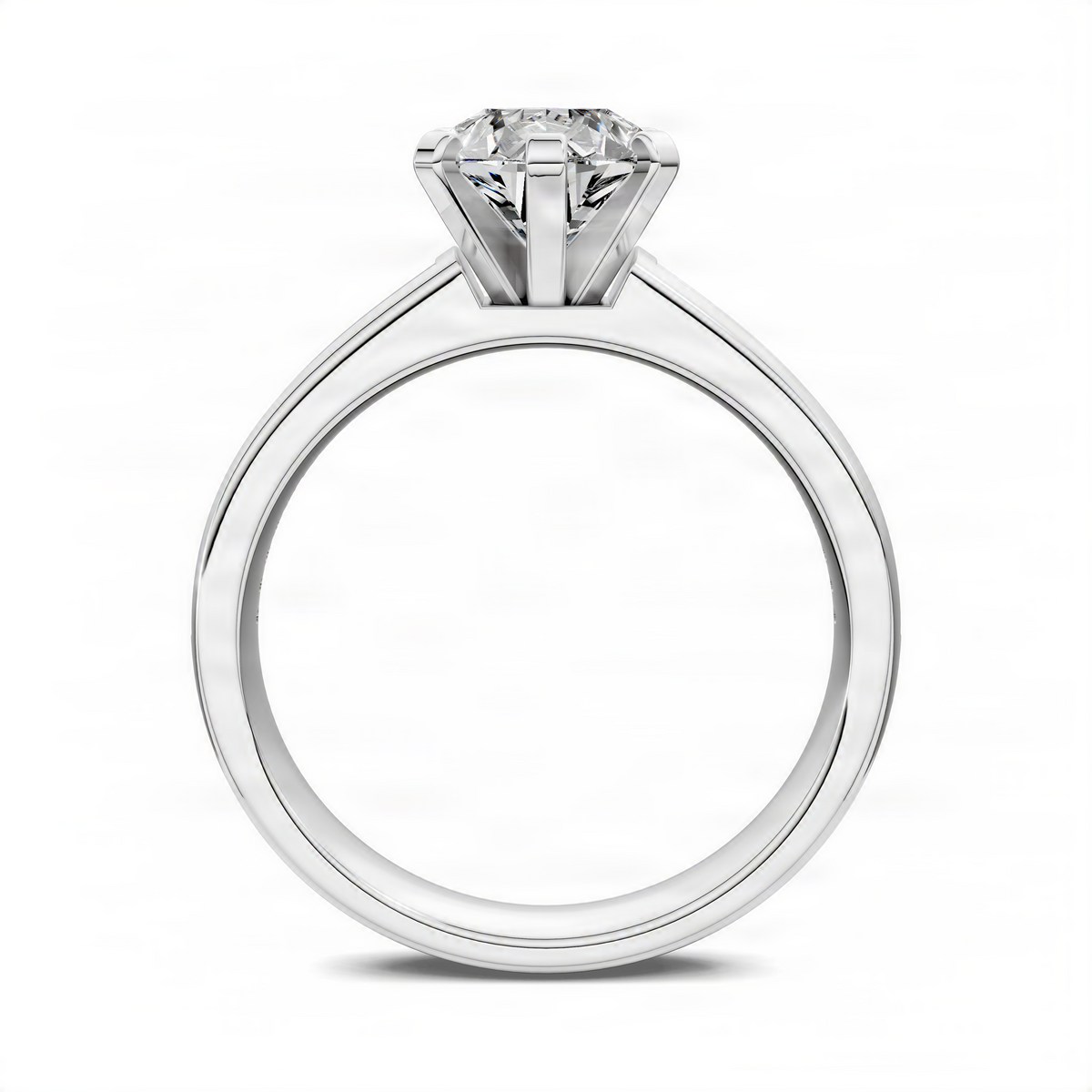 White gold ring with pear-cut center stone and prong-set top