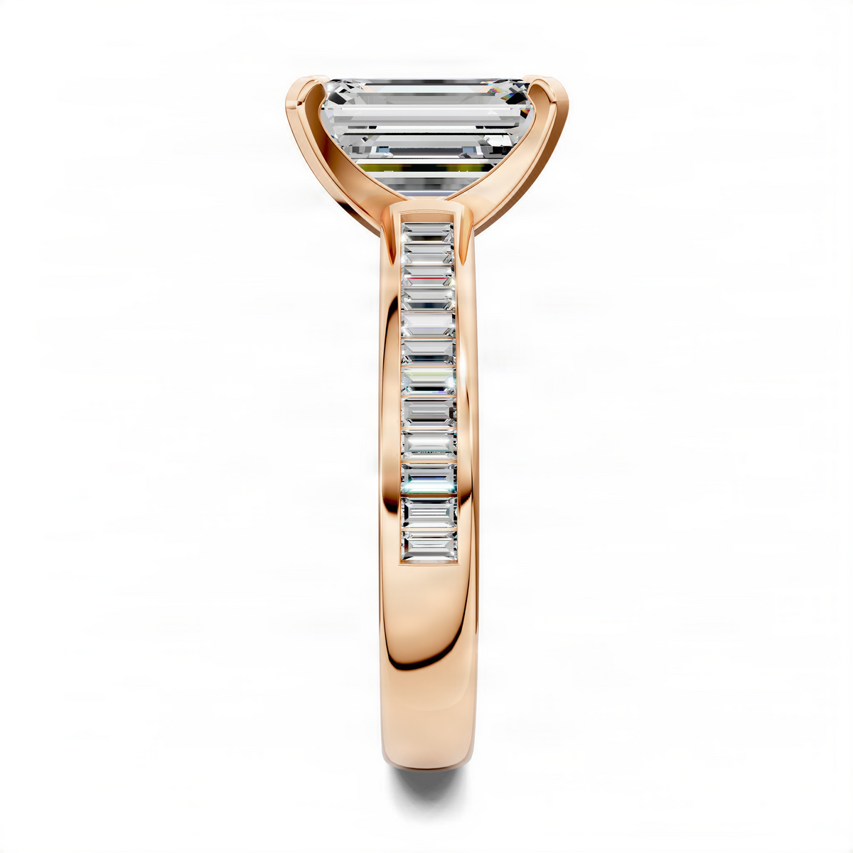 Emerald baguette channel ring in rose gold with baguette-cut side stones