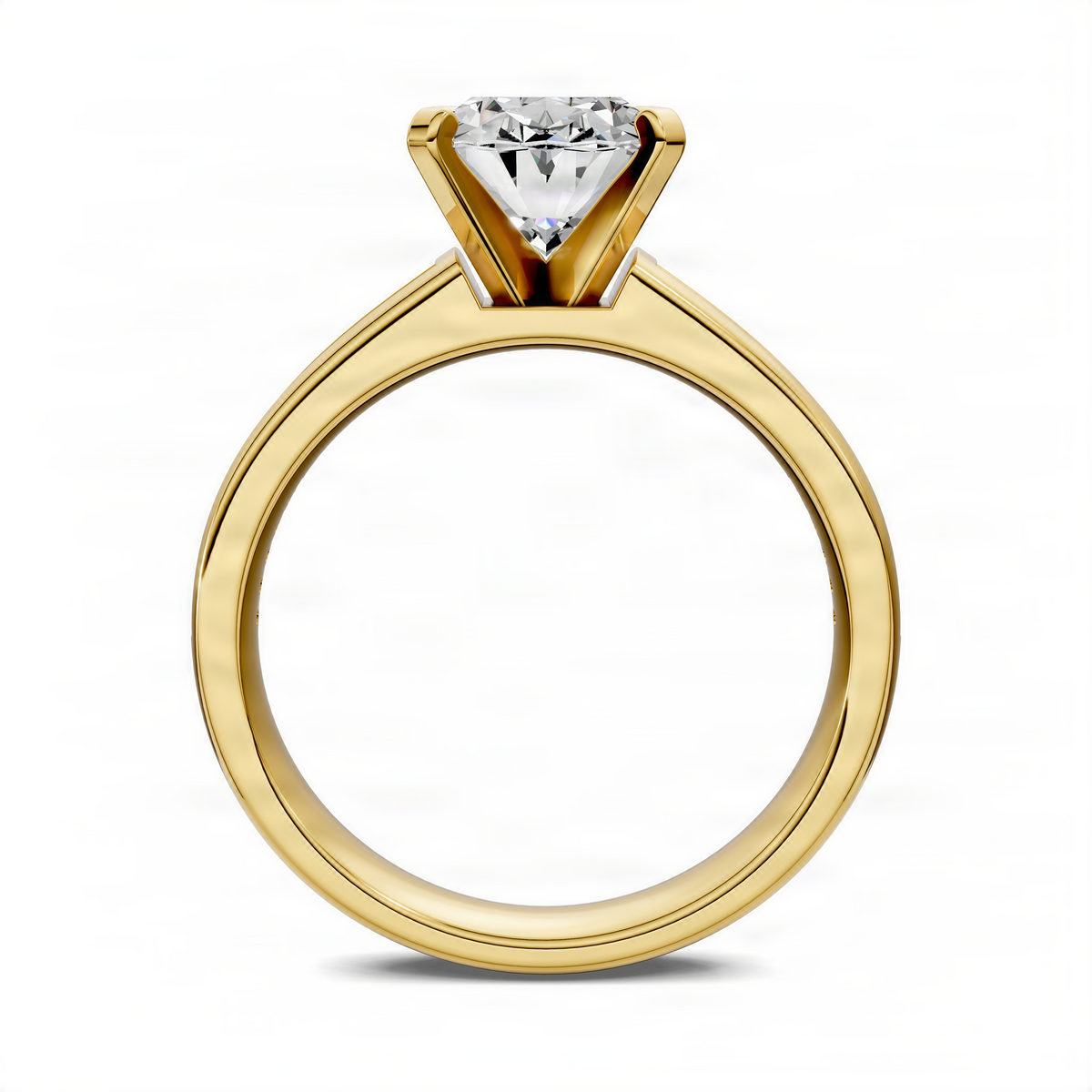 Yellow gold ring with oval center stone and prong setting