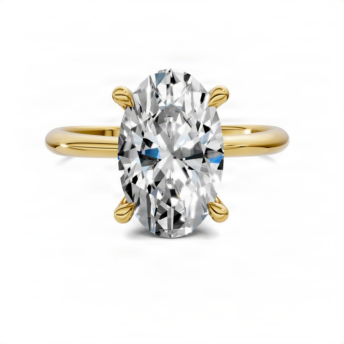 Yellow gold oval center stone ring with hidden halo detail and side accents
