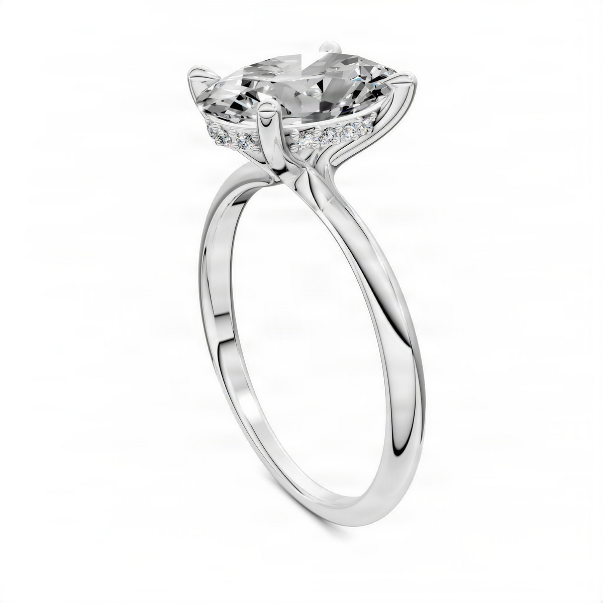 Oval hidden halo ring in white metal with pavé accents, side view