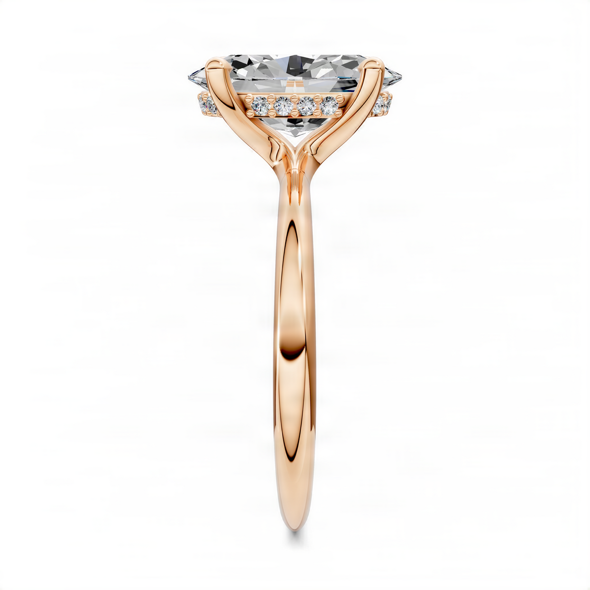 Rose gold oval center with hidden halo, three-prong ring setting