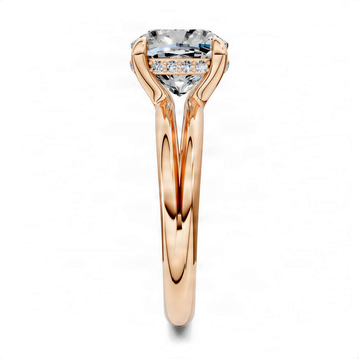 Cushion split band ring in rose gold, with round-cut side stones and clear center gem