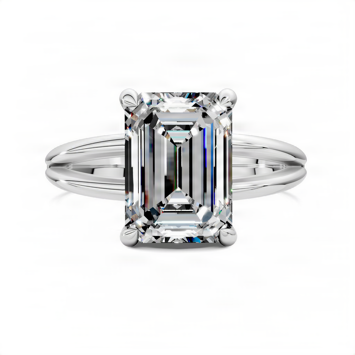 White metal emerald-cut center diamond ring with split band and side baguette accents