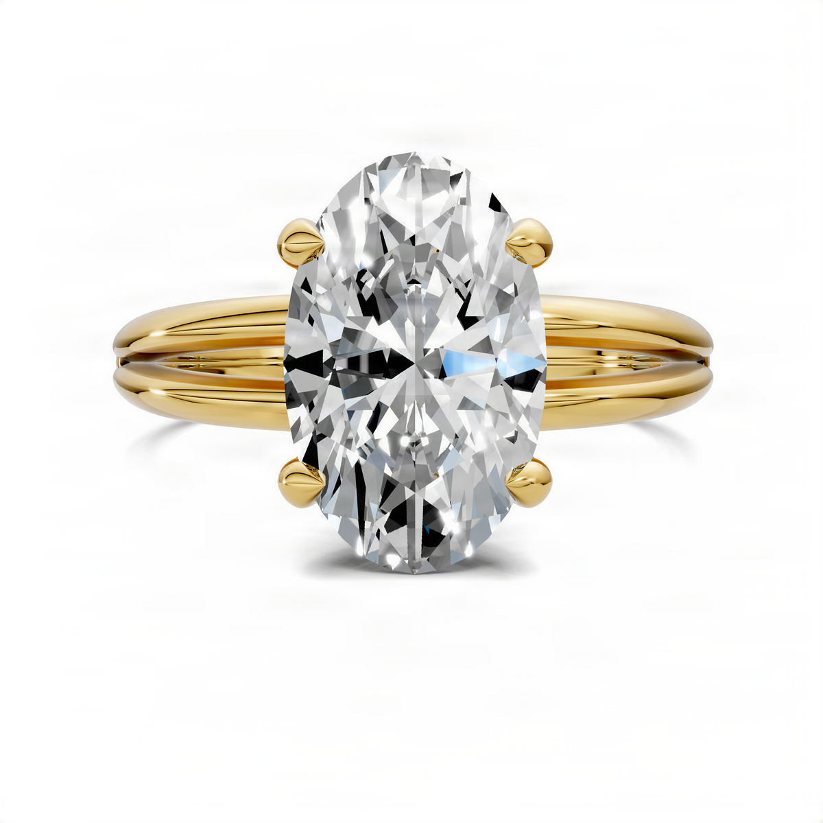 Yellow gold oval center stone ring with 4-prong setting and split shank