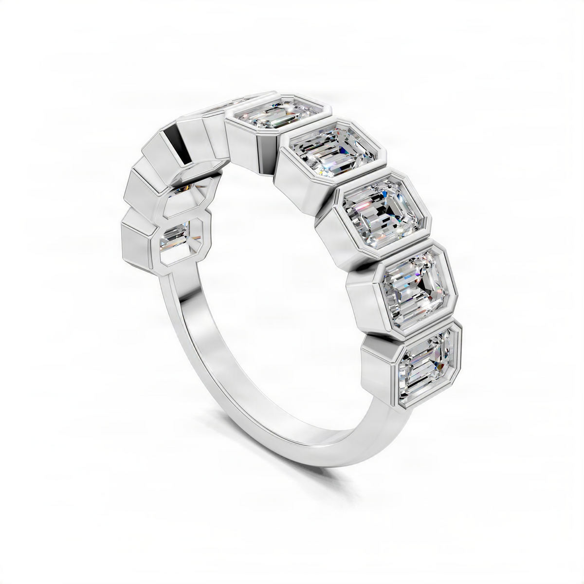 Emerald-cut bezel gemstone band ring in white gold, angled view of five stones