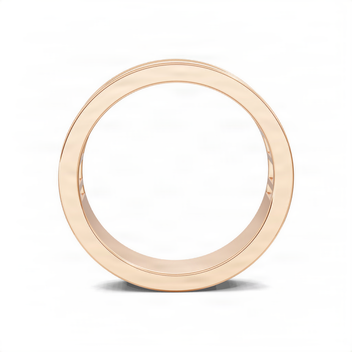 Rose gold wedding ring with smooth outer band and clean inner profile