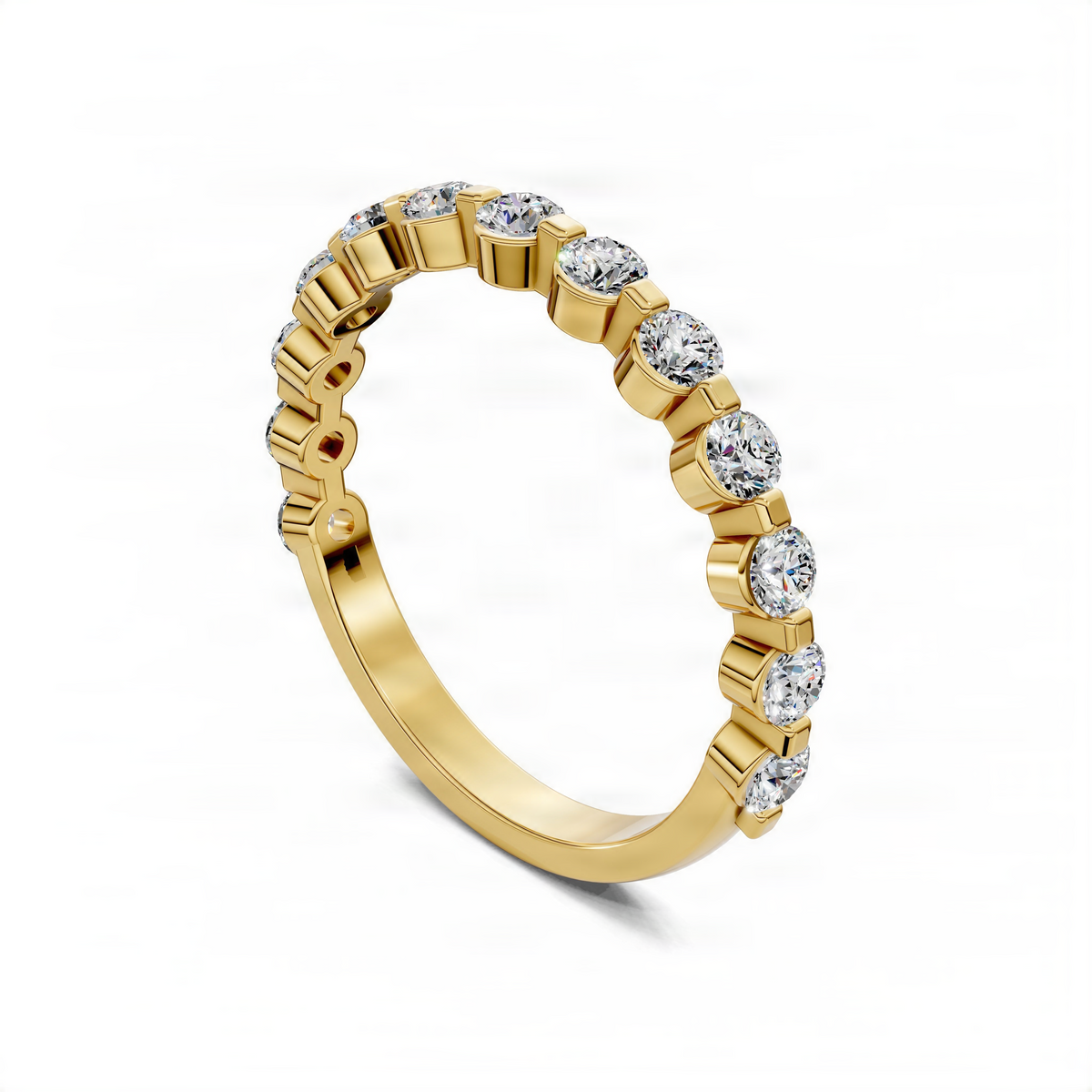 Yellow gold wedding band ring with round bezel-set diamonds around the band