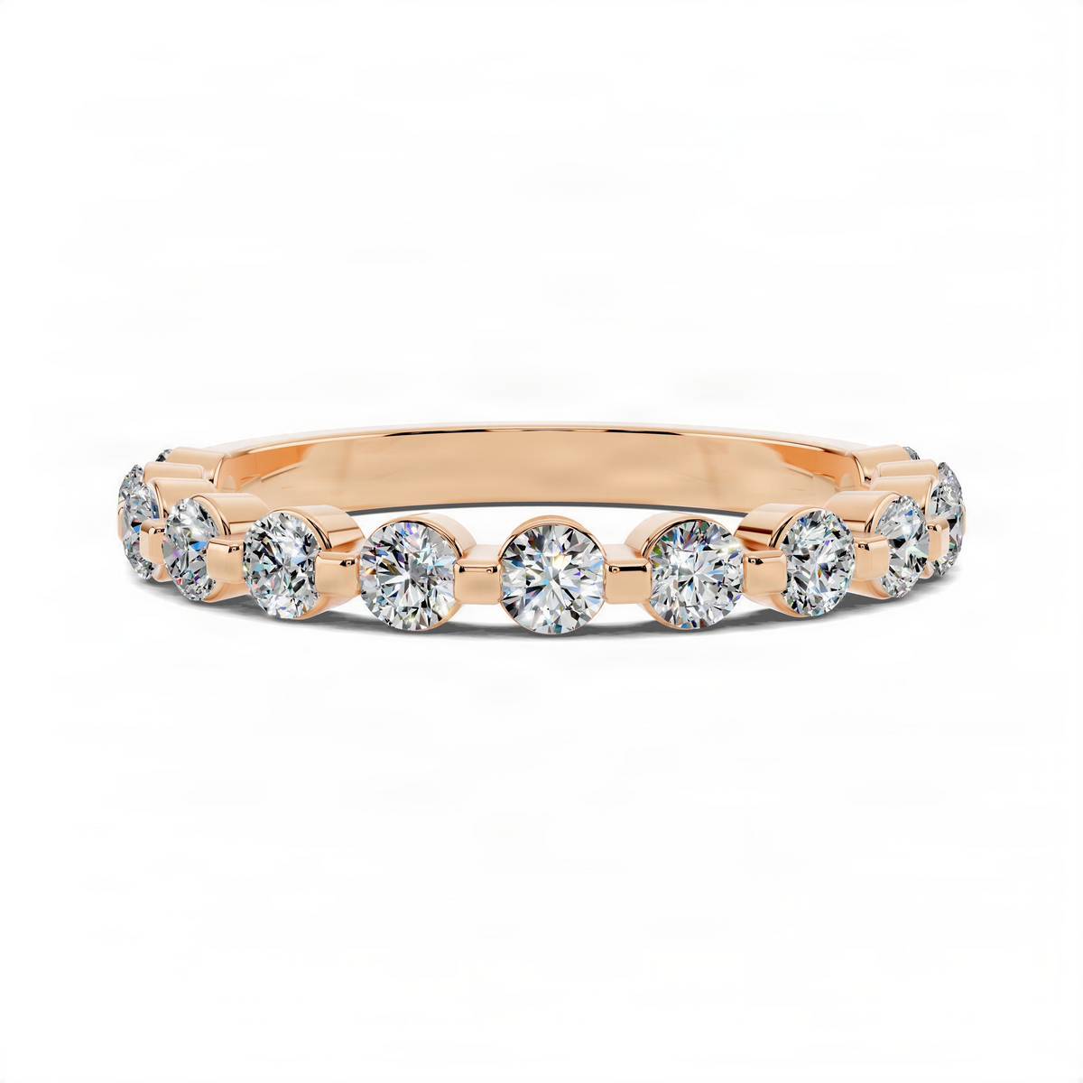 Rose gold wedding band with round bezel-set diamonds in a continuous row