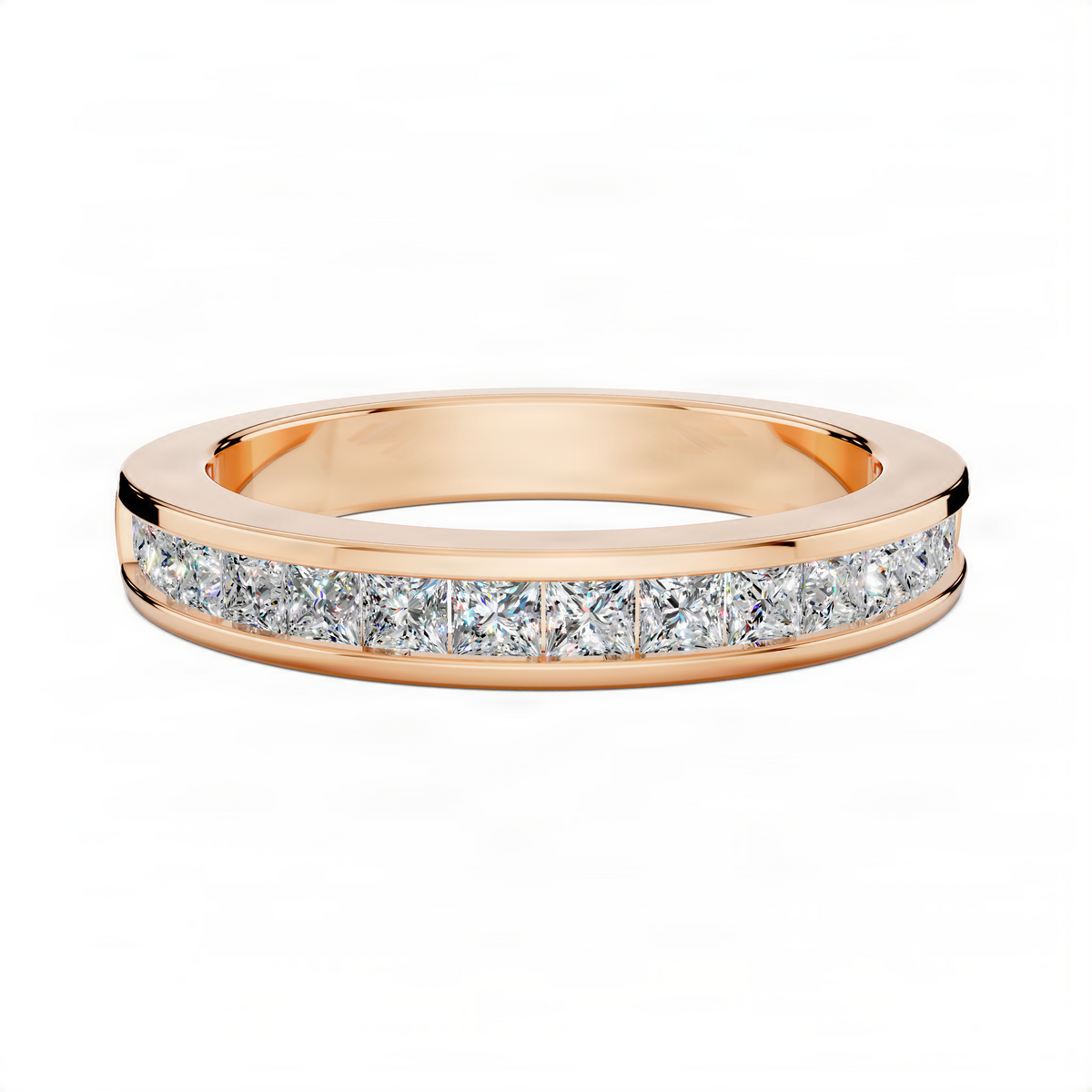 Rose gold wedding band with channel-set baguette diamonds across the top