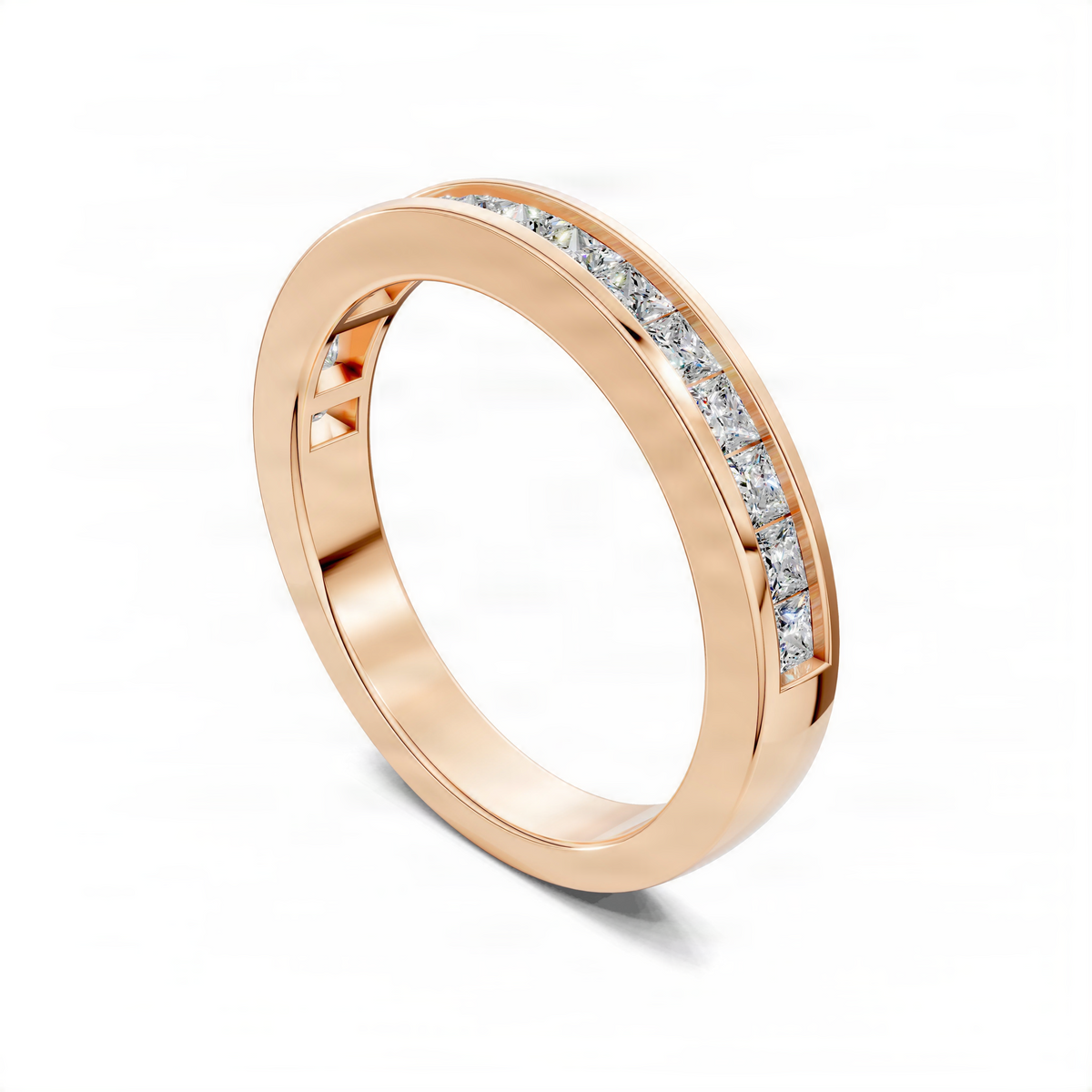 Rose gold wedding band with channel-set baguette diamonds along the side
