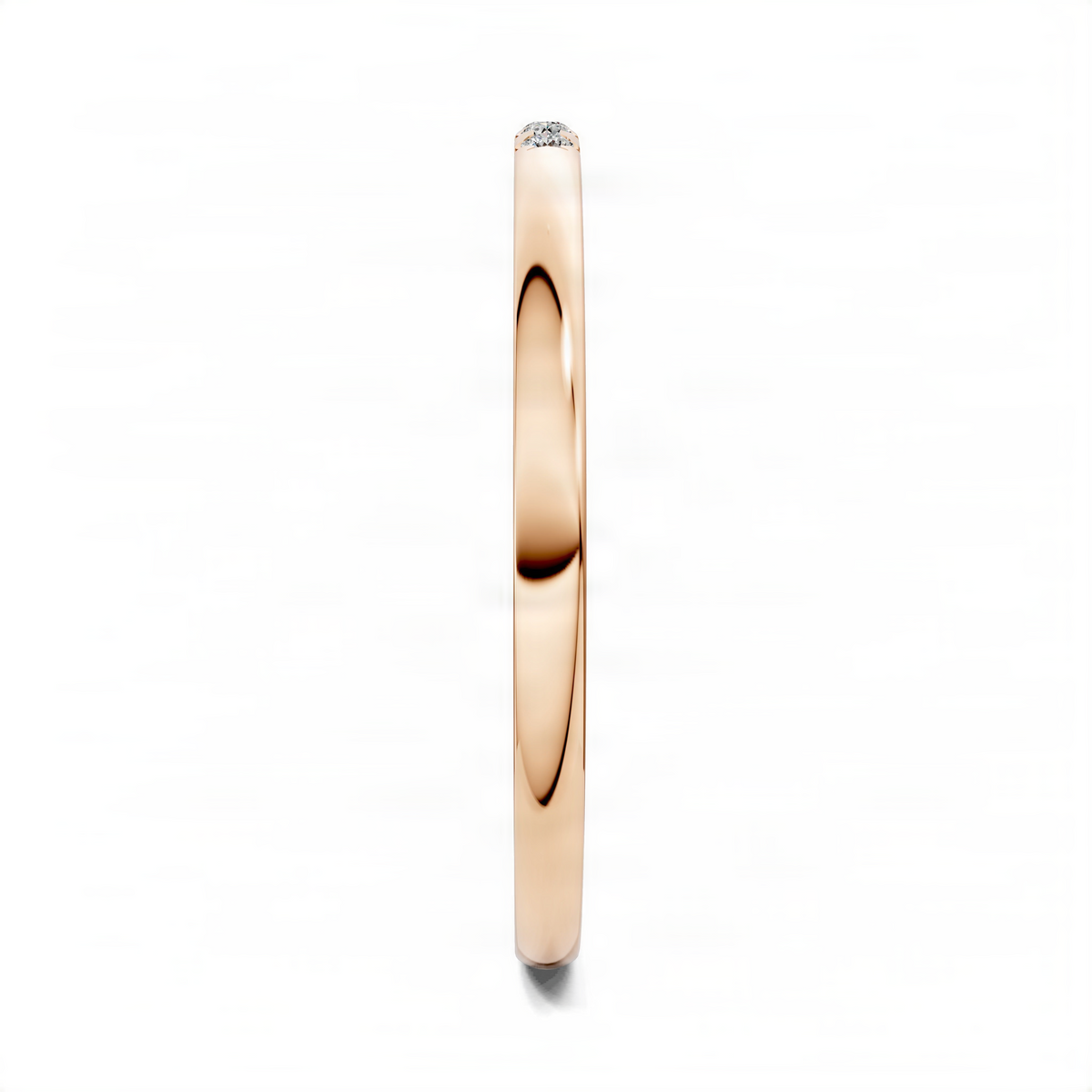 Rose gold diamond band ring profile with small round stones set along the top.