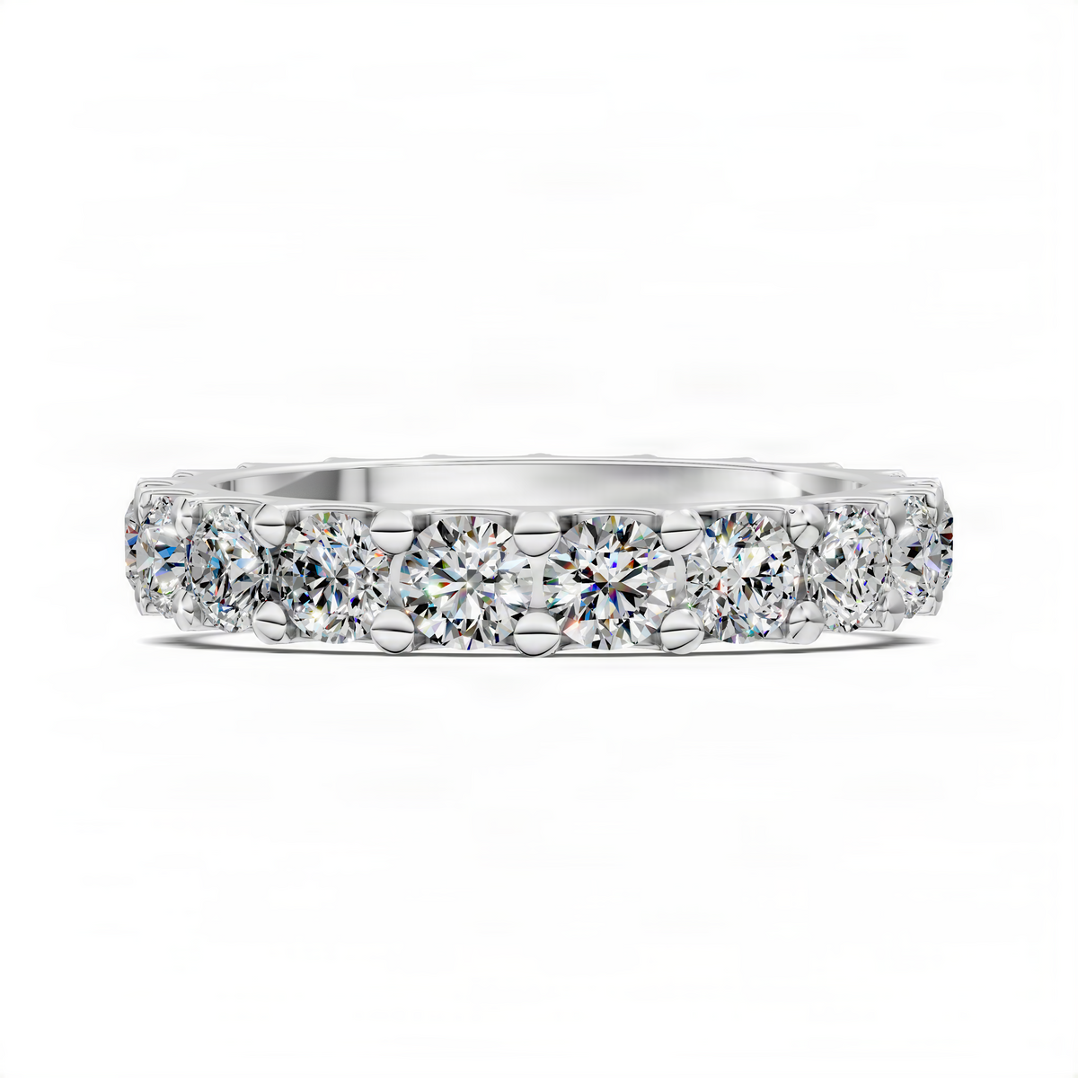 White gold round eternity band with prong-set sparkling round stones in a continuous row