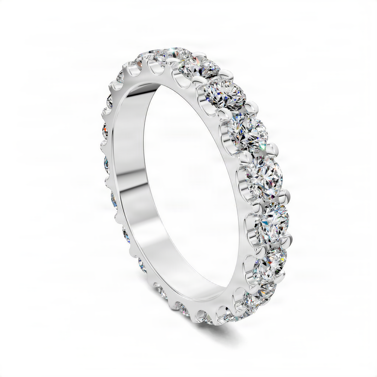 White gold round eternity band with prong-set sparkling round stones along the outer edge