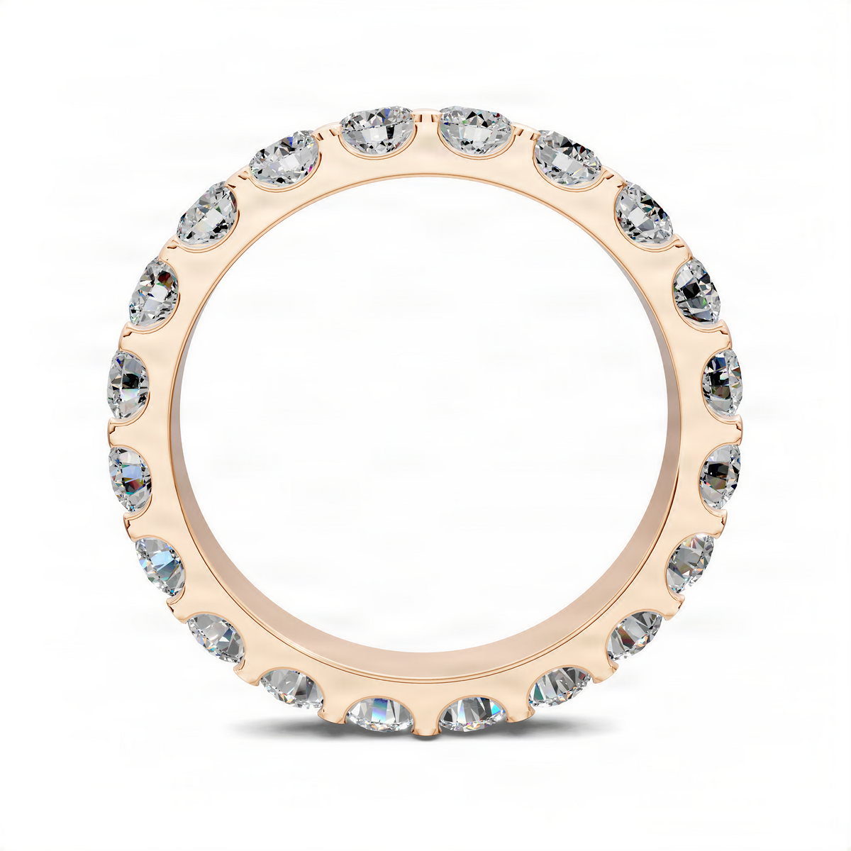 Gold round eternity band with bezel-set clear stones, scalloped edge