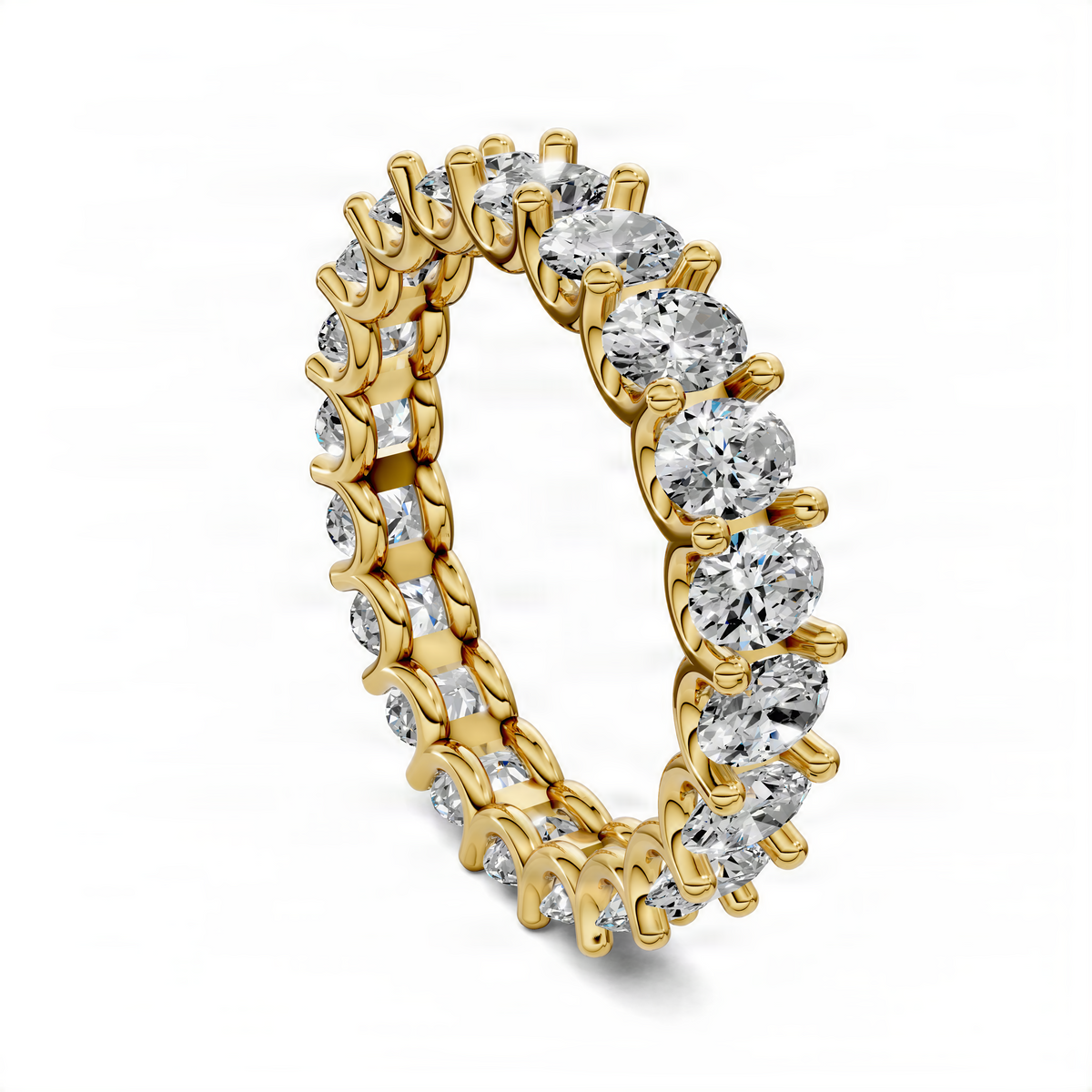 Oval eternity ring in yellow gold with oval diamond bezels along the band