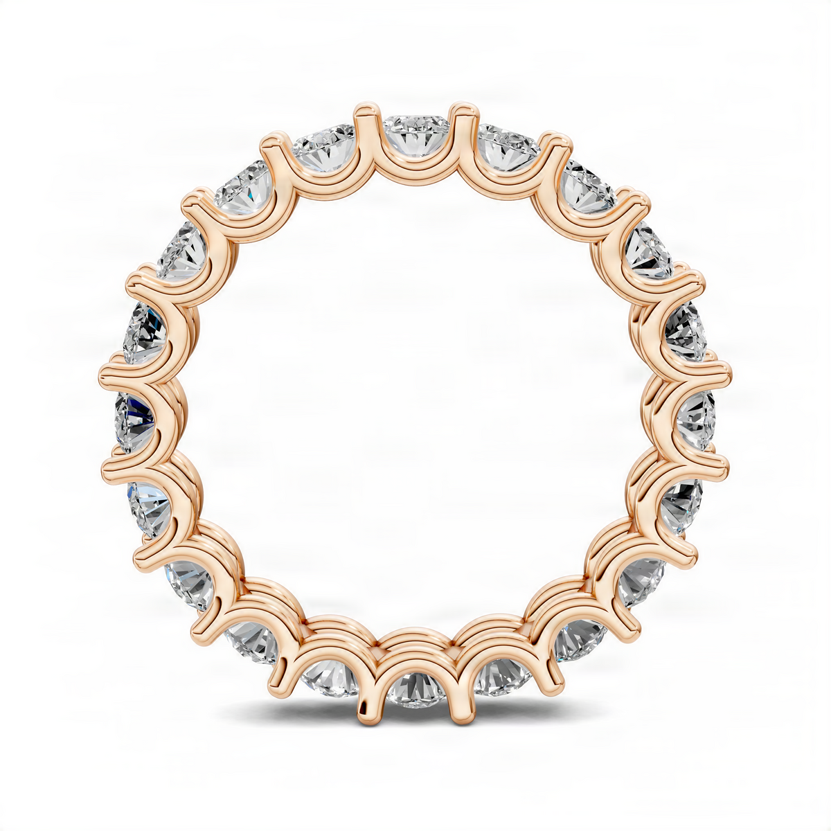 Oval eternity ring in rose gold featuring a full circle of oval diamonds